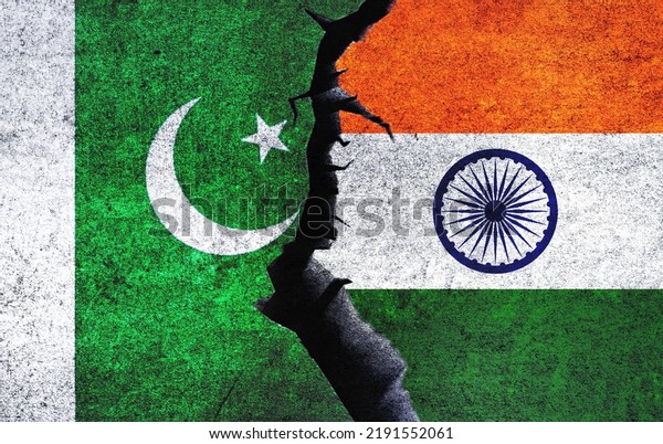 India vs Pakistan concept flags on a wall with a\
crack. Pakistan and India war crisis, political conflict, economy,\
relationship, trade\
concept