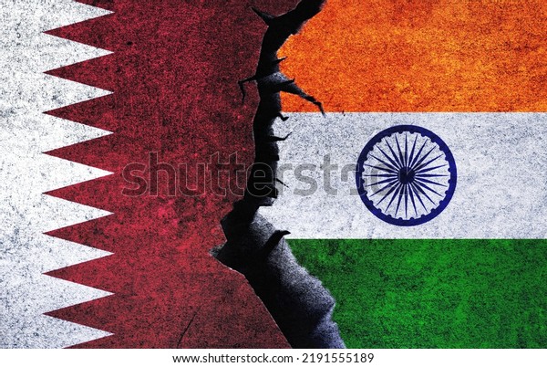 India vs Qatar concept flags on a wall with a\
crack. Qatar and India war crisis, political conflict, economy,\
relationship, trade\
concept