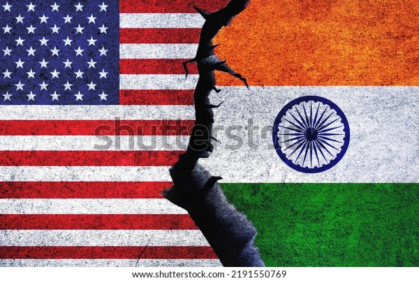 India vs USA\
concept flags on a wall with a crack. United States of America and\
India political conflict, economy, war crisis, relationship, trade,\
sanctions concept