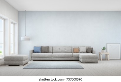 Indoor Plant On Wooden Coffee Table And Big Sofa With Empty Blue Concrete Wall Background, Relaxing Area Near Window In Sea View Living Room Of Modern Luxury Beach House - Home Interior 3d Rendering