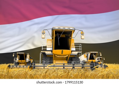 Industrial 3D Illustration Of Four Orange Combine Harvesters On Farm Field With Flag Background, Yemen Agriculture Concept