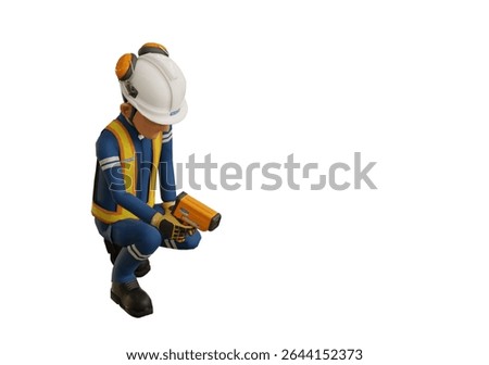 Industrial worker is measuring the temperature with the pyrometer