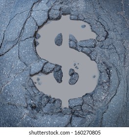 Infrastructure Costs And Road Construction Repair Budget As A Business Symbol Of  The Expenses Of Fixing Urban Highways As An Old Asphalt Street Damaged With A Pothole In The Shape Of A Dollar Sign.