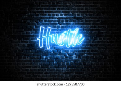 Inspirational Motivational Word Hustle in Blue Neon Light on Brick Wall