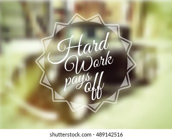 Inspirational Vintage Typo: Hard Work Pays Off with blurred car background. 
 - Powered by Shutterstock