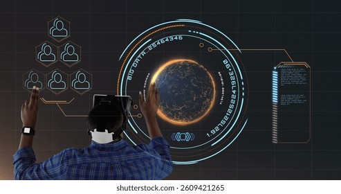 Interacting with virtual interface, person using VR headset over digital globe image. Virtual reality, digital interface, futuristic, technology, innovation, cyber