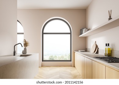 Interior with the double sided kitchen cabinet in the light area with arch windows behind. Wooden and marble details. Light beige walls. Sink on the left and stove on the right. Parquet. 3d rendering