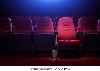 Interior of empty dark cinema with rows of red seats with cup holders and popcorn. Concept of entertainment. 3d rendering toned image - Powered by Shutterstock