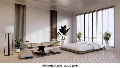 Interior Mock Up With Zen Bed Plant And Decoartion In Japanese Bedroom. 3D Rendering.