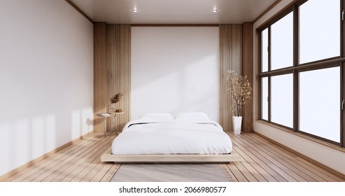 Interior Mock Up With Zen Bed Plant And Decoartion In Japanese Bedroom. 3D Rendering.