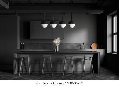 Interior Of Modern Industrial Style Kitchen With Dark Grey Walls, Wooden Floor, Grey Countertops With Built In Sink And Comfortable Bar With Stools. 3d Rendering