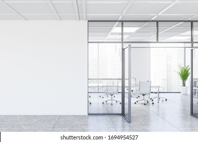 Interior Of Modern Meeting Room With White And Glass Walls, Concrete Floor, Long Conference Table With White Chairs And Windows With Blurry Cityscape. Mock Up Wall To The Left. 3d Rendering