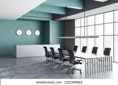 Interior Of Office Meeting Room With Dark Green And Gray Walls, Concrete Floor, Large Window, Long Gray Table With Black Chairs And Reception Desk With Clocks. 3d Rendering