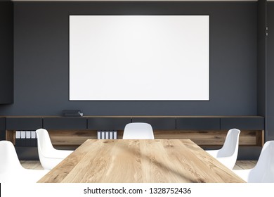 Interior of office meeting room with gray walls, wooden floor, long wooden table with white chairs and horizontal poster. 3d rendering mock up - Shutterstock ID 1328752436