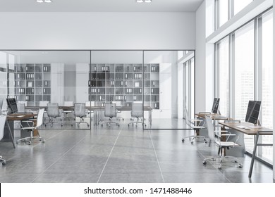 Interior Of Open Space Office With White Walls, Tiled Floor, Computer Desks And Meeting Room With Glass Walls In The Background. 3d Rendering