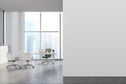 Interior Of Panoramic CEO Office With White Walls, Concrete Floor, White Computer Table With Chairs For Visitors And Window With Blurry Cityscape. Mock Up Wall To The Left. 3d Rendering