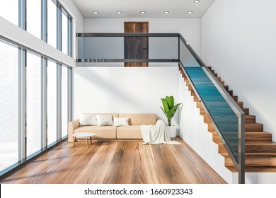 Interior of panoramic living room with white walls, wooden floor, beige sofa with round coffee table and staircase. Window with blurry cityscape. 3d rendering - Powered by Shutterstock