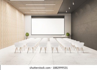 Interior Of A Presentation Room With White Chairs And Blank Screen. Conference And Presentation Concept. Mock Up. 3D Rendering