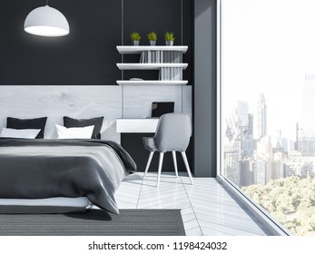 Interior of stylish bedroom with black walls, wooden floor, gray master bed and neat computer table in the corner. Close up. 3d rendering