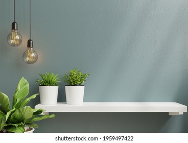 Interior Wall Mockup With Green Plant,Light Blue Wall And Shelf.3D Rendering