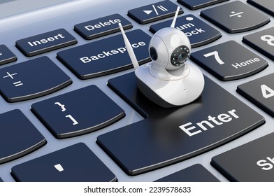 Internet Protocol camera on laptop keyboard, 3D rendering