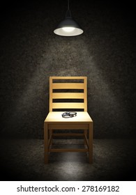Interrogation room with one wooden chair illuminated with spotlight and handcuffs