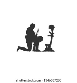 Isolated Silhouette of Soldier Kneeling at Military War Memorial of Fallen Soldier with Helmet Gun and Rifle in Combat Boots