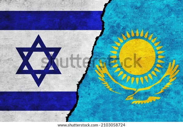 Israel and Kazakhstan painted flags on a wall\
with a crack. Israel and Kazakhstan relations. Kazakhstan and\
Israel flags\
together