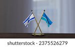 Israel and Midway Islands flags on table. Negotiation between Midway Islands and Israel. on little blur background. 3D work and 3D image