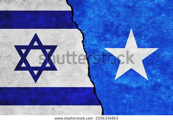 Israel and Somalia painted flags on a wall with a\
crack. Israel and Somalia relations. Somalia and Israel flags\
together. Somalia vs\
Israel