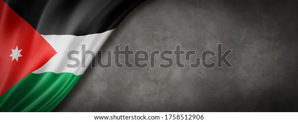 Jordan flag on concrete wall. Horizontal\
panoramic banner. 3D\
illustration