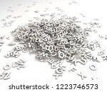 A jumbled pile of 3D illustrated white uppercase letters over a white background.  Great for typegraphy, education, design, or business applications.