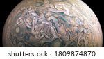 Jupiter planet in outer space close-up, photo of gas clouds taken by spacecraft. Texture surface of Jupiter, giant atmospheric turbulence. Solar System concept. Elements of image furnished by NASA.