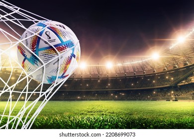 Karachi, Pakistan. October 1, World Cup Qatar 2022, Fifa Football With Soccer Goal Soccer Ball With Flags In Net At Soccer Stadium 3d Rendering