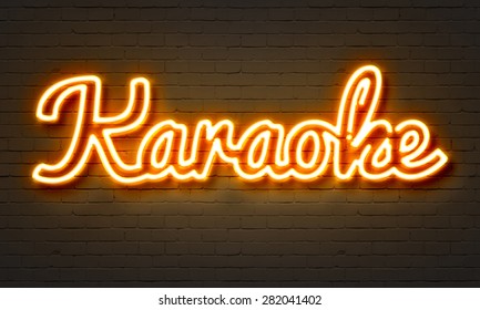 Karaoke Neon Sign On Brick Wall Background