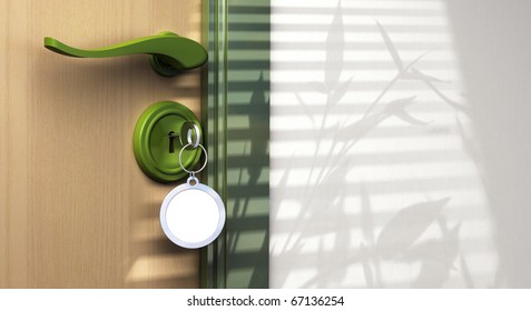 Key Chain With Home Sweet Home Written On It. The Key Is Inserted Into A Lock, The Handle Is Visible And There Is Copyspace On The Left Side Of The Picture