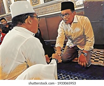 Kuala Lumpur, Malaysia - March 10 2021: An Illustration Of Anwar Ibrahim Shaking Hands With Community