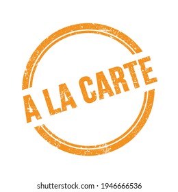 A LA CARTE text written on orange grungy vintage round stamp.