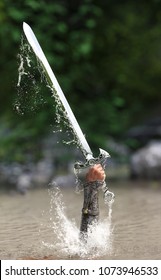 The Lady Of The Lake Thrusting A Sword In The Air. 3d Rendering