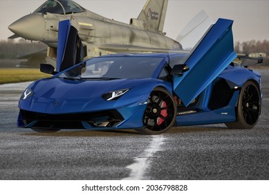 Lamborghini Aventador On The Eurofighter Typhoon Plane Background.3D Illustration