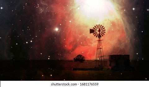 Landscape With A Windmill Water Pump On Farm Land And Night Sky