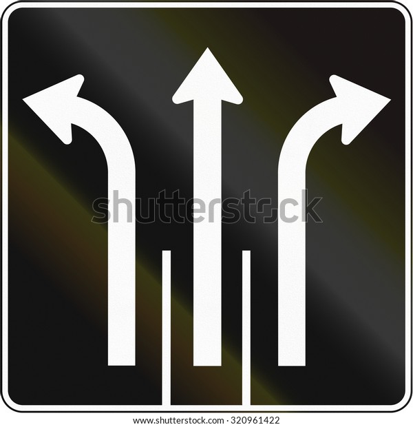 Lane management sign in
Canada - Three lanes for different directions. This sign is used in
Quebec.