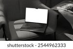 Laptop blank white screen. Aesthetic work space. black and white color. Website, blog, social media.