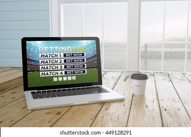 Laptop With Coffee Showing Live Online Betting Website On Screen Near The Window. 3d Rendering.