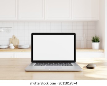 Laptop Mockup On Wooden Top With The Sun Rays In A White Cozy Kitchen. 3d Illustration.