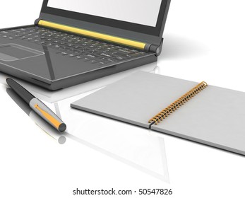 laptop with a notebook and pen