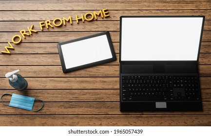 Laptop or Notebook screen and tablet blank white. Office equipment, computer on the wooden table, Bottle of alcohol gel and a sanitary mask. Work from home concept to prevent Covid-19.  3d rendering