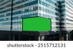 Large billboard with a green screen for advertising on the building wall. 3D illustration