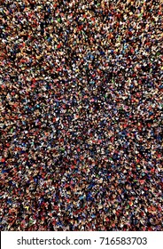 Large, dense and diverse group of people seen from above
