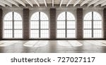 Large empty room in loft style with big arched windows illuminated by sunlight.
Interior mock up with wooden floor and brick wall. 3D render.
